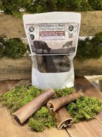 Floppy Ear 100% Natural Beef Skin Dog Chew 500g pouch with loose rolls on moss