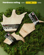 Floppy Ear 100% Natural Fallow Deer Antler Dog Chew on wooden plank with moss