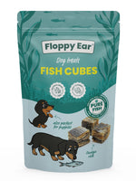 Packaging of Floppy Ear Fish Cubes dog treats with illustrations of dogs and fish.