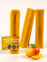 Floppy Ear Himalayan Yak Chews Mango Flavour three chews with fresh mango
