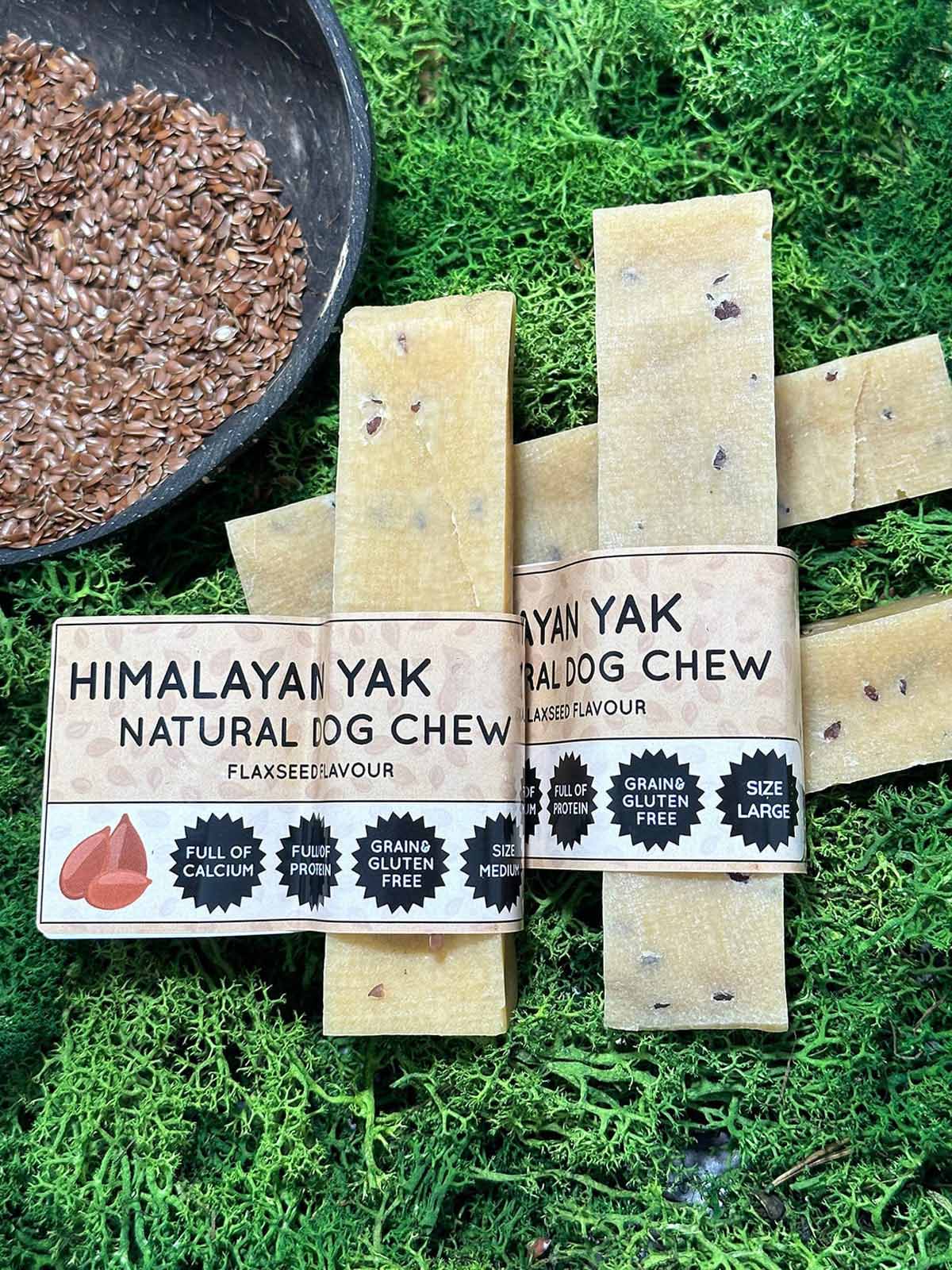 Floppy Ear Himalayan Yak Dog Chews Flaxseed Flavour Medium and Large sizes on moss with flaxseeds