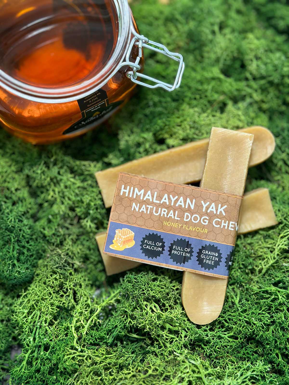 Floppy Ear Himalayan Yak Chews Honey Flavour Medium size on moss with honey jar