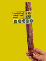 Floppy Ear Jumbo Bull Pizzle Dog Chew held in hand