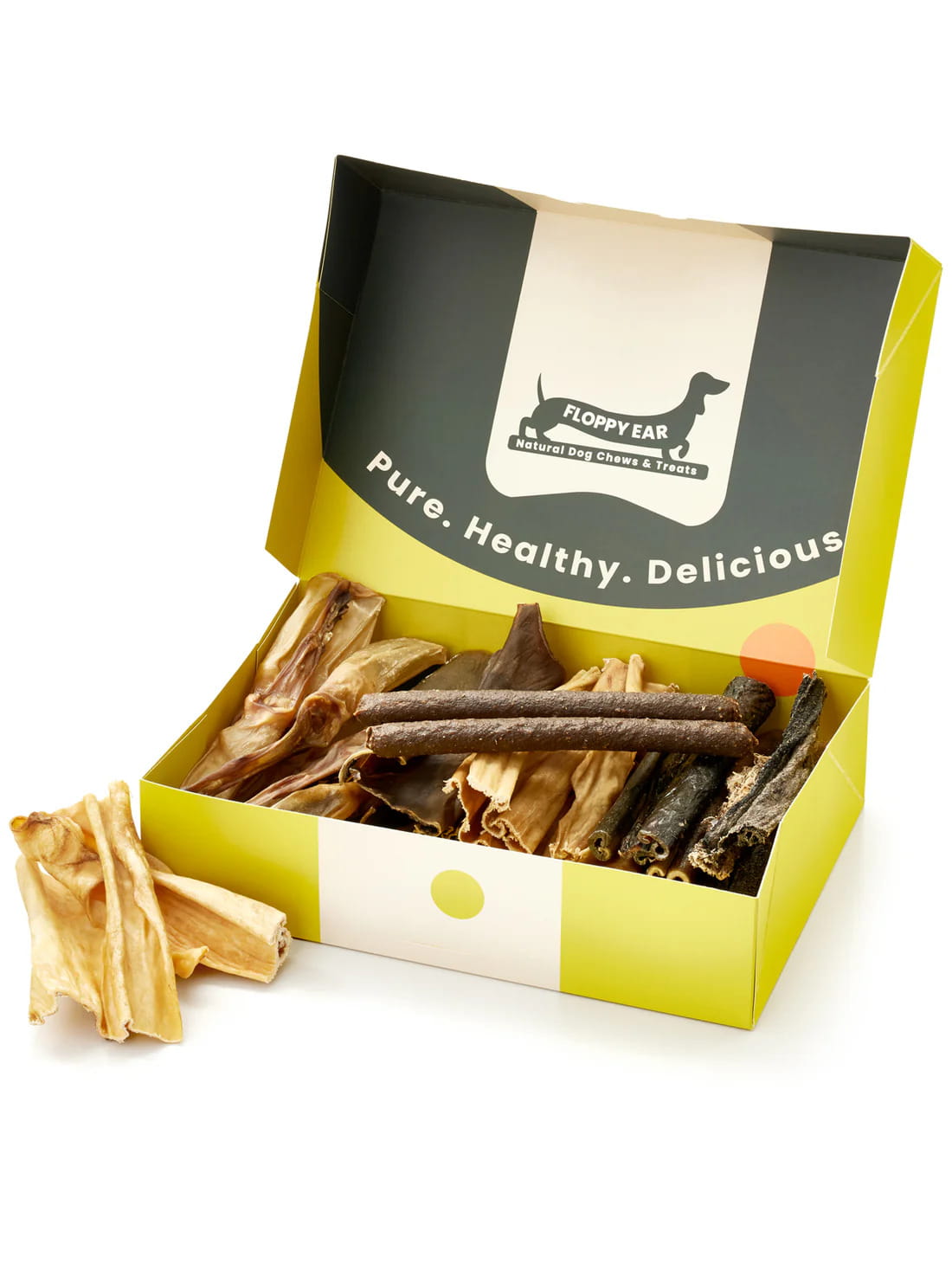 Floppy Ear Natural Chews & Treats Box open at an angle showing variety of premium natural dog chews and treats inside with "Pure. Healthy. Delicious." on the lid