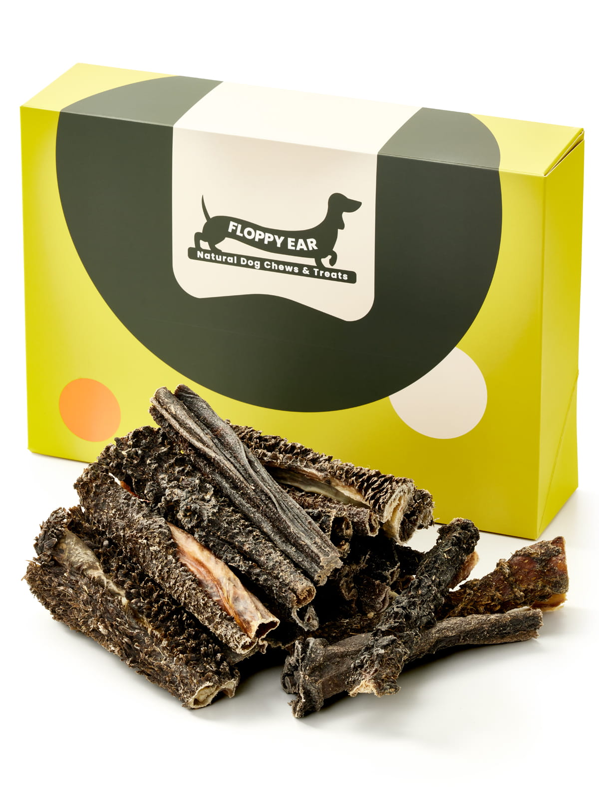 Floppy Ear Beef Tripe Chew Box closed with large pile of natural dried beef tripe chews in the foreground